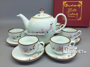 Bộ ấm chén men trắng vẽ hoa đào hồng